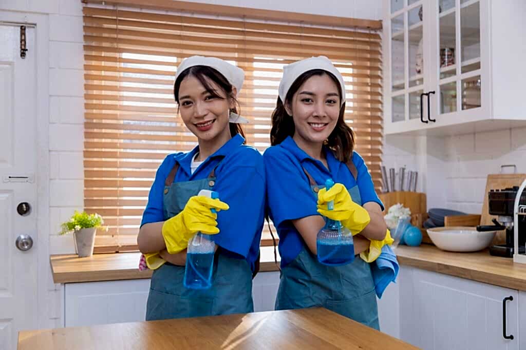 A professional cleaning team using eco-friendly products and equipment